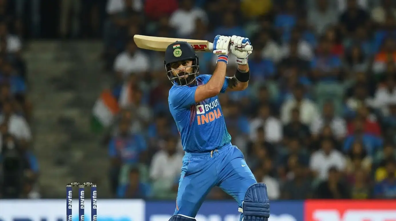 Virat Kohli playing an aggressive shot while representing India in a limited-overs match